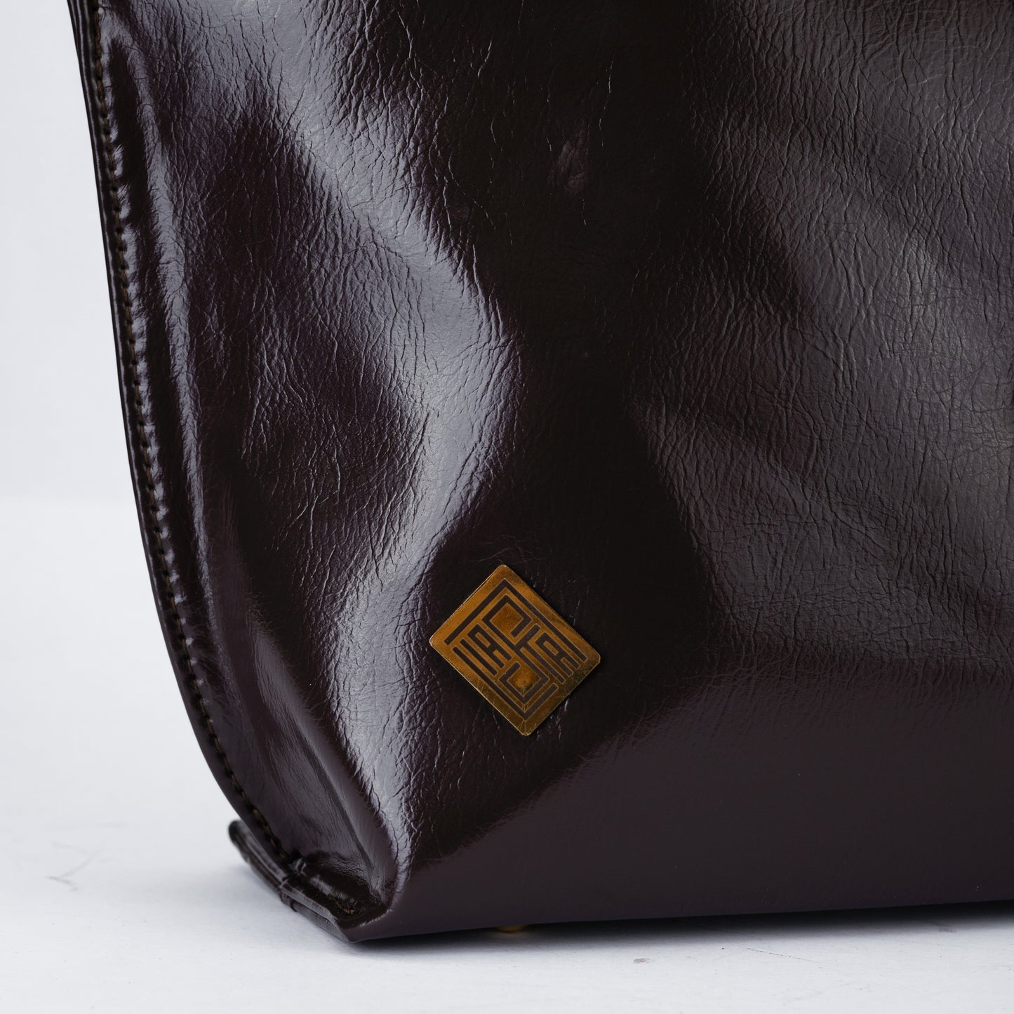 Minimal Glossy Handbag with Gold Accent